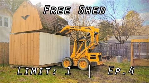 move shed with skid steer|moving storage shed on skids.